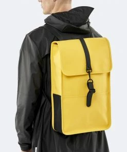 RAINS Backpack Yellow -Men's Travel and Luggage http3A2F2Fstatic.theiconic.com .au2Fp2Frains 3637 554428 4